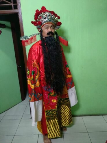 Caisen Dewa Uang Koh Robin